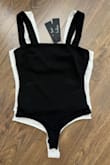 I bought this bodysuit in 2 colours: Black + White, both in size: XS, but the white one runs way too large. Since the white one is on sale, can't ask for refund. Disappointed! - Winny L.
