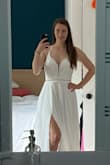 You can adjust the straps of the dress using the lacing in the back which is another detail which adds to the beauty of this already magnificent dress. I feel right at home in this dress even though I bought it thinking it's was pretty different than my usual style. - Tahlia H.