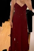 It's very flowy, comfortable on my skin, and it's double-lined. Slit cuts at around mid-thigh for me. I had to shorten it due to my height. Happy with the purchase! - Sophia H.