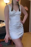 So cute! I bought it for my reception dress for my wedding. It's a bit tight around my midsection but fits everywhere else. With shapewear, it will be fine! The material is nice and thick just a little wrinkly. - Victoria B.