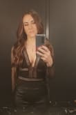 This top fits perfectly. Sexy, classy, and elegant. Perfect amount of stretch. Loves the color. Paired with black leather pants. - Rebecca G.