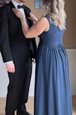 I loved this dress!! I needed to hem and pull up the shoulders a bit as it was a bit low cut for me. Perfect for my son's wedding. I felt amazing in this dress. The material is heavy with lots of layers so none of your lumps and bumps show!! - Lisa G.
