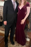 The material is so soft and fits like a glove. I wore to a formal winter wedding. The vneck is super low but flattering. Definitely recommend double sided tape to help it stay in place. - Erica W.