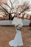 I fell in love with this dress, and after trying on so many dresses I knew this was the one!! It did need a bit of tailoring and a bustle and then it was perfect! - Lauren S.