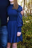 This dress is perfect!  Perfect for that in between teen who is hip enough for XS women's and small enough for large kids sizes.  Slight shimmering that is very subtle (almost unnoticeable) but makes the fabric look high end.  The photo does not do justice! - Ali J.