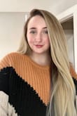 The sweater fit true to size, so if you want something baggy go up a size. I love the colors and how it complimented me. I felt casual while being comfortable yet fashionable. - Raven J.