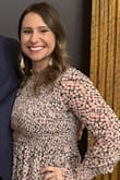 This dress is so cute and so comfortable! For me, it was a TAD short in the back. Everyone thought it looked great so it might have just been me. I definitely could not bend over though. Get the dress! - Scarlett E.