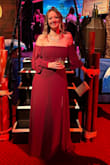 Fit perfectly and got tons of compliments!  Super comfortable yet flattering as it skims your hips but it's not too tight.  I wore it for a "night on the high seas" themed fundraiser that I didn't want to go full pirate for. - Maureen F.