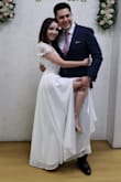 I loved this dress. I wore it to my wedding reception dress. I got many compliments and it was so comfortable and fun to wear. The opening on the leg is definitely a great touch. The skirt was too large but I knew that already from the other reviews so I had it tailored. It was absolutely beautiful! - Gisell A.