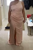 I bought this dress to wear at my friend's wedding as a bridesmaid. The dress quality is great and it hugs me in all the right places. I love the ruched detailing in the front. - Giselle M.