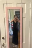I go back and forth between a small and a medium, and I went with a small for this dress. It worked super well for a formal, and definitely a dress I will keep for other formals. Looked classy, and matches any heel. - Claire M.