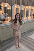 My daughter wore this for a roaring 20s bash. She's 12, and it was fitted but classy on her. She got compliments all night! Great quality and beautiful on. Highly recommend!! - Stephanie W.