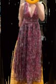 This dress was really pretty, but felt much more "princess" than the photo shows. The colors weren't as rich (much more pink/purple) and the skirt was reallllly puffy. In the photo, I used my hand to pull a bunch of the fabric back to make the skirt less dense. The top was gorgeous though! - Kadie O.