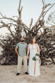 I wore this dress for my elopement and it was so comfortable! It didn't cling and I felt so sexy with the side slit. The peekaboo lace and halter design worked well as I have broad shoulders. Highly recommend this dress! - Sara F.