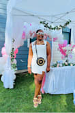 I wore this romper at my wedding barbecue. Such a beautiful time with fam. - Alexandra T.