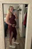 I am 28 weeks pregnant and ordered a small! Super stretchy, comfy and flattering! Thinking about getting a different color as well! - Michelle H.