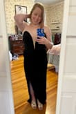 I was originally considering it in pink, but then we were asked to wear black for the wedding, so I decided to order both in different sizes since the black was going in and out of stock. I figured if the pink worked in a medium I'd keep that for another occasion and find something else in black, but the black in large worked perfectly! I will say I did also fit into the medium comfortably, BUT my cleavage is a little more subtle in the large which is preferable Hopefully I can find heels high enough that I don't need to get it altered, but I will say as a petite person it doesn't drag nearly as much as a lot of maxi dresses tend to. Can't wait to get better pictures, but mirror selfies have to do for now! - Natalie S.