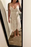 Perfect a-line cut. I've gained some weight and it really covers most problem areas. Tight and fitted in the bust and waist and then loose the rest of the way down. I think it will be perfect for my bridal shower! - Jamie B.