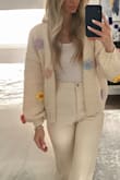 Absolutely gorgeous cardigan! I've received so many compliments wearing this cardigan. Quality is very good too! - ANDREA B.