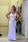 I chose this dress out of the 4 I ordered. It is so lovely and flattering!  I need to have the hips taken in and the length hemmed a bit because I want to be able to dance without tripping on it.  The photo is before alterations. - Dawn E.
