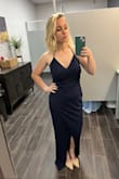 Slimming dress. I'm a mama of 2 and this helped me boost my self-confidence! It's a super comfy dress! The straps are very long so I got a safety pin and pinned it back to cross it. I'm 5'0 tall so long dresses aren't easy on me, this one didn't drag as bad! It was long but I wasn't tripping over it in my heels either. I feel like this could be a fancier casual dinner dress or it could be a perfect extreme formal dress! - Rachael C.
