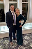 This dress fits true to size. Such a pretty color for a winter wedding. I typically don't love long dresses, but this one was perfect! - Erica C.