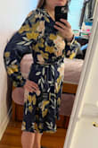 since it's a true wrap dress, 100% tie together, it does take a bit of fiddling but can really fit to your exact body. I also LOVE the sleeves (balloon?) Wearing to a wedding in the fall! - Claire S.