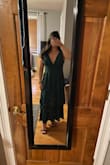I wasn't sure if I should get the medium or large, but I decided to go with large. It is a little roomy, but not too big. V-neck is very flattering.  Quality is great and it's very elegant. - Nicole M.