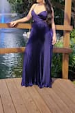 The dress looks beautiful, what I liked the most was the color and the quality of the fabric. It fit me well, I bought Small size. The dress It's not heavy at all, but for me it was too long (I'm 5'3), it had to be hemmed. The only thing that I didn't like was the zipper on the back, it's too obvious and poor quality. - Eloimar M.