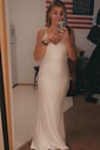 My fiancé and I are eloping and then having a reception. I wanted something simple yet elegant and this will do it! I originally ordered a small and it fit but decided I wanted something with a little more room (so a girl can enjoy cake and food). I opted for a medium and am getting it tailored to shorten it a little bit and the straps cleaned up (they're adjustable just didn't want that in my pics). For the price, this is such a nice material dress with great quality! - Abigail H.
