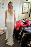 I ordered like every white dress in search for my wedding dress. This was the one! It fit basically perfect right out of the box, just needs the straps shortened a little. It's so comfy and elegant and I love it! - Corinne H.