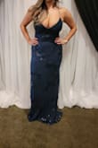 This dress is beautiful. It fit perfectly - Erica D.