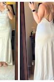 The dress:

The dress itself was good quality but nowhere near as low or loose in the back as I was looking for. It's most likely because I'm decently tall.

My return experience:

This dress was kept in the original bag and box it came in and only taken out to try on. With my height, it only barely even touches the floor. I was denied a refund and only offered store credit (as a "one time exception") for "the presence of hairs and fibers" on my return. This was a lie. The picture provided after I requested one is not even of the same material as this dress. - Serafina L.