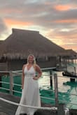 The dress and fabric was much thicker and higher quality than I was expecting. Flowed perfectly without heels for my height. Wore it for our 10-year anniversary trip in Tahiti and got many compliments. True to size. - Vanessa S.