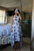 I bought this dress for summer events and I love it! The fabric is nice however I docked off one point because it's so wrinkly and high maintenance. I already washed and steamed it once and it's already wrinkled again just from sitting in my closet. However it's beautiful and I love the halter design and cutout at the waist - Ashley D.