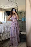 Would have been perfect for a spring wedding, the color and print is gorgeous. However, the fit is way too large on the bust and of course too long. When relaxed the bust area just flares out (sleeves need to be shorter (otherwise the cut goes almost to my belly button if pulled down). I'm going to take this to a tailor to see if I can get the fit right. - Ashley D.