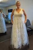 I picked this dress before we even had a venue because it looked good in every size and I could picture it on the beach, in the mountains, or in the backyard! Needed alterations to shoulders for lift and added cups. The strap alterations really helped the waist from bunching. It is sooo comfortable I can wear it all day long in Mexico no problem. Can't wait to see it with my hair and makeup actually done!!  UPDATE:  I didn't wear the cups my seamstress added... and now I regret it.  It would have made a big difference in the photos.  I machine-washed it and hung dry because the bottom was filthy after a long day outside.  It came out perfectly. - Kathleen W.