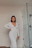 I felt like sooo glammed in this stunning jumpsuit. That material is quality and expands really well over bust & curves. The neckline runs a little long so I will have to get the busy tailored, but it fits perfectly everywhere else! - Jaala S.