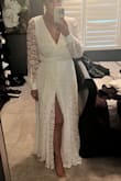 Material is nice and dress seems well made. - Jennifer K.