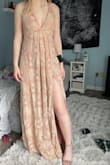 Returned it immediately. You have to be bigger in the chest to fit properly and it runs big. Coloring is much more yellow than the pics show. It's not terrible just not what I was wanting or expecting. Reminded me of my grandma's dining room tablecloth. - Laci S.