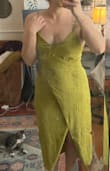 This dress is perfect for summer and the faux wrap helps hide the tummy even after a big meal! The back was a little loose but I'd rather feel comfortable than it be too tight. And ultimately the color is the best thing about this dress! So flattering! - Elizabeth W.