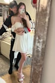 I wore this for my engagement photos and it was perfect! The inside has a lining so it doesn't fall down at all and you won't feel like it will fall down either! I may even re-wear it for my bridal shower! - Kristin F.