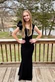 This dress is so much prettier in person. The material is heavy enough that it didnt wrinkle much either. - Ashley W.