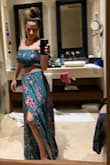 Ordered for an upcoming vacation in the Caribbean and it really is the perfect dress! I got a medium which fit the top perfectly but likely needs to be a little hemmed as I'm only doing 5'4. I highly recommend if going on vaca or live somewhere tropical - Liz B.
