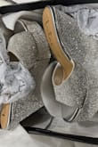The Sheree Rhinestone Platform Wedges run a bit too big on my feet. - Bich T.