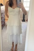 Planning to wear to my bridal shower. Very flattering - Madelyn B.