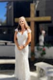 This dress was perfect for my JP wedding! I did have to get it hemmed a little since I was wearing 3 inch heels. It was a little loose in the stomach area but I wanted it that way. This dress is definitely worth the price! All my family gave me huge compliments and said it was perfect! - Dena B.