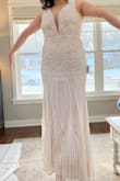 Ugh, I love this dress. It's so gorgeous!! The main reason I didn't go with this one was simply because it doesn't fit the vibe of my venue. It would be great for a 20s-themed wedding! I still love it though and it was surprisingly comfortable! I don't typically expect dresses with a lot of sequins to be comfortable, but it had a nice amount of give/stretch to it. - Christiane L.