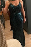This dress is very well made. The fabric has just the right amount of stretch. I would definitely buy it again! - Christine K.