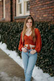 This shirt is a fav of my photography clients! It fits true to size and makes everything look good! You can even wear without a bra! The color is beautiful and the fit is stunning. - Malia D.